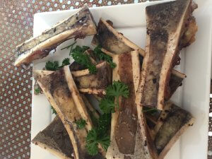 Roasted beef marrow.  Not the best looking thing on the table but they are irresistible